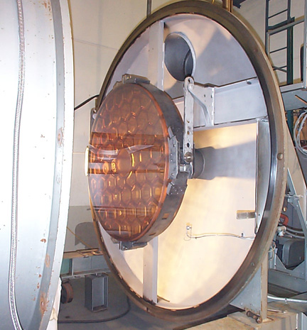 Mirror entering the vacuum tank